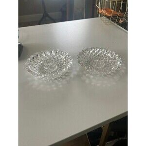 A pair of vintage cut crystal votive or taper candle holders.